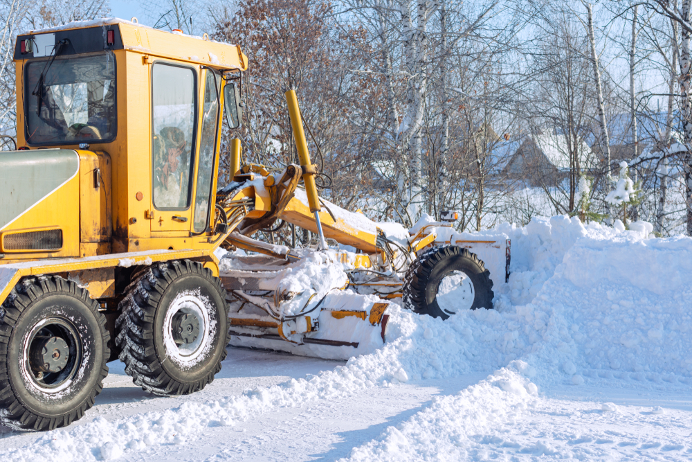 除雪グレーダーによる除雪作業